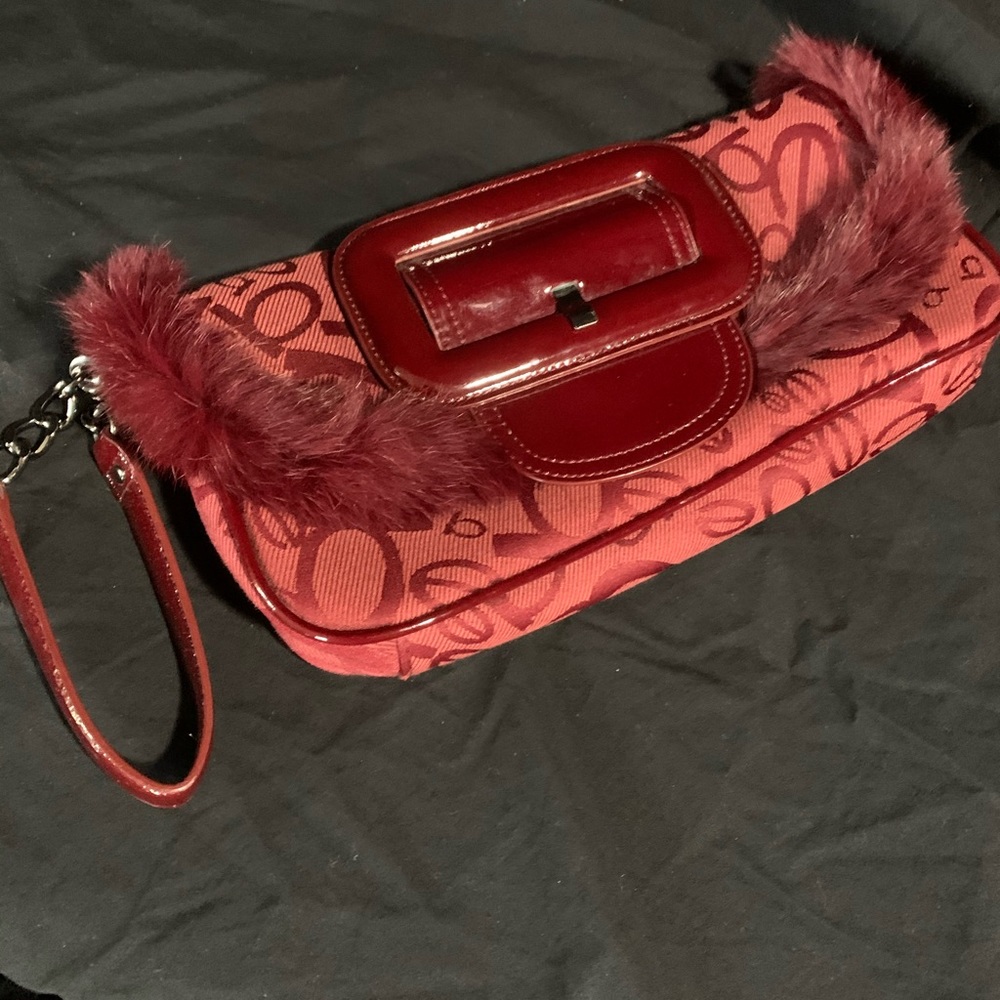 BEBE maroon/dark red clutch with fur lining